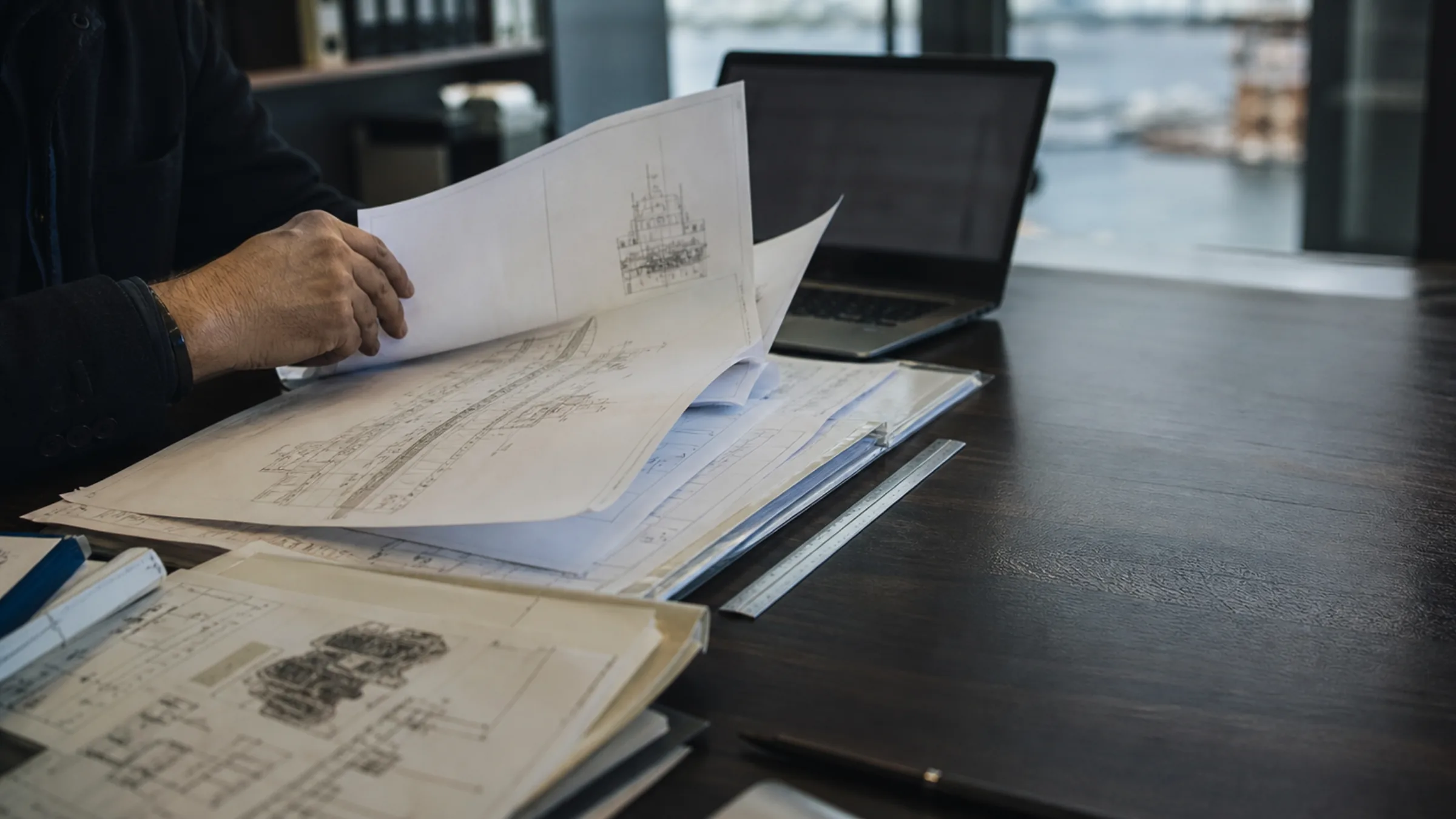 Records and drawings being reviewed before an inspection